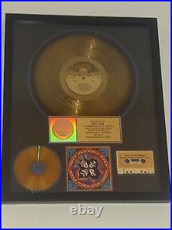 Kiss rock and roll all over riaa gold awrd presented to eric carr