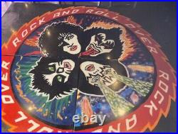 Kiss rock and roll over Table(s)