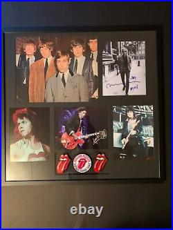 Rolling stones autographed complete band and manager autographed framed display